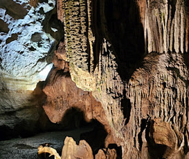 A group of people are standing inside a cave at Indian Echo Caverns in Hummelstown, PA